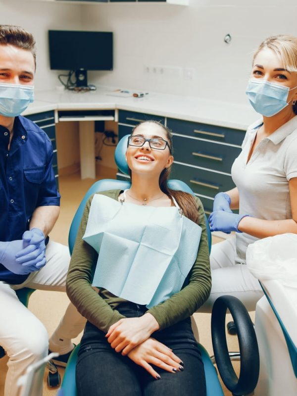 dentist-and-patient-2021-08-26-18-29-36-utc-min.jpg