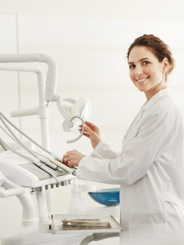 female-dentist-2021-09-24-04-00-12-utc-min-e1692225704263.jpg